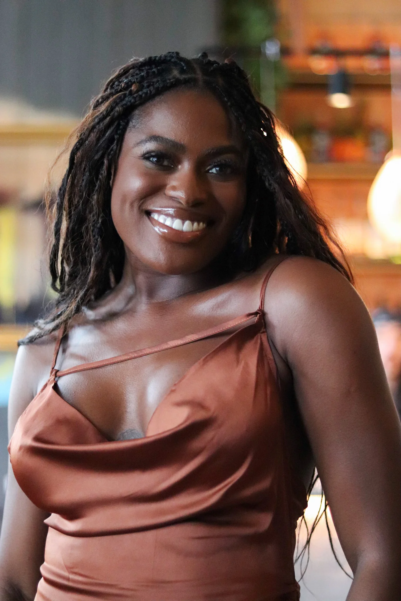 black girl in a brown dress