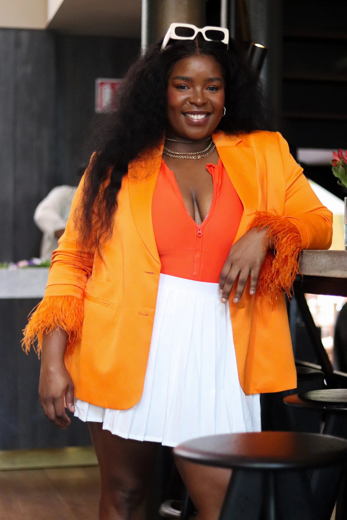 girl in orange outtfit